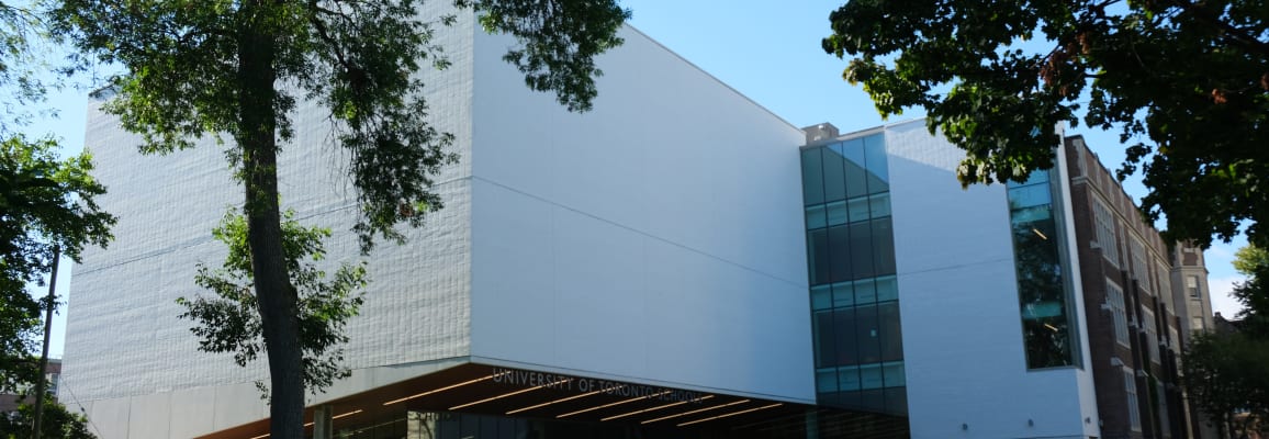 Exterior of University of Toronto School with white brick.