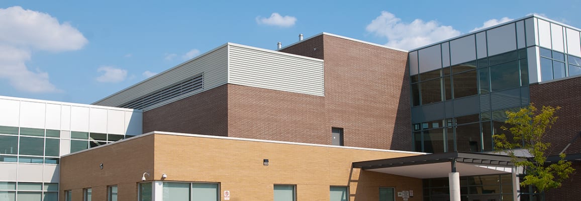 Exterior of building with red and yellow brick.