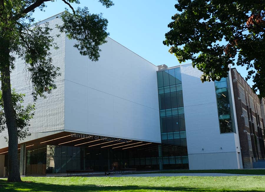 University of Toronto School exterior with white brick.