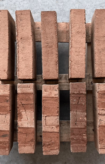 Red bricks stacked together.