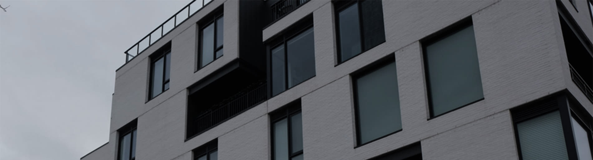 Junction Condo in Toronto with white brick.