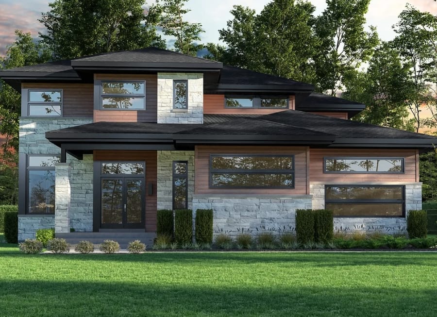 Two story modern house with grey wall stone and wood panels.