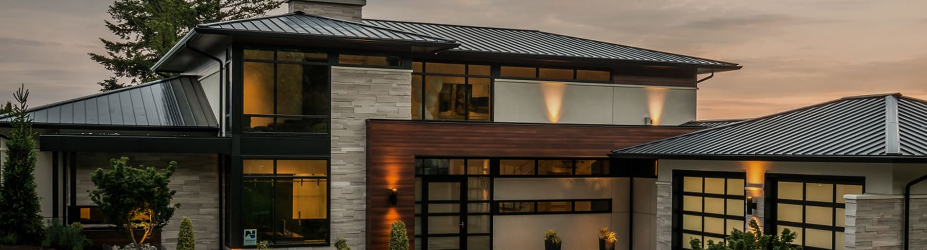 Exterior of a house with light beige stone.