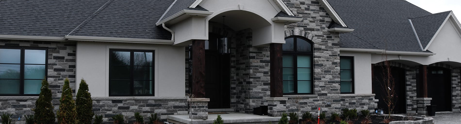 Exterior of a house with light grey stone.